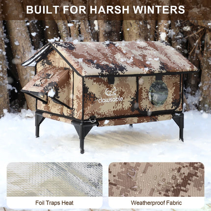 Camouflage outdoor cat house built for harsh winters, featuring foil insulation to trap heat and weatherproof fabric, elevated on sturdy legs, perfect for keeping pets warm in snow.
