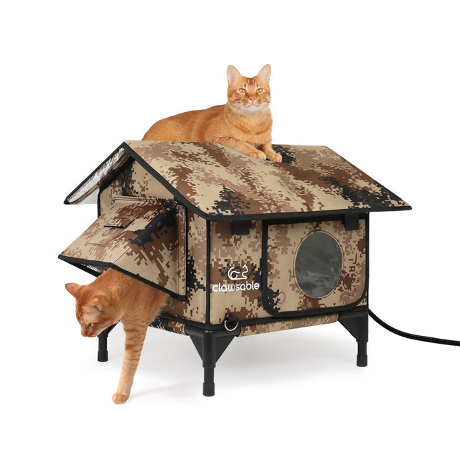 Camouflage cat house with two cats on a white background