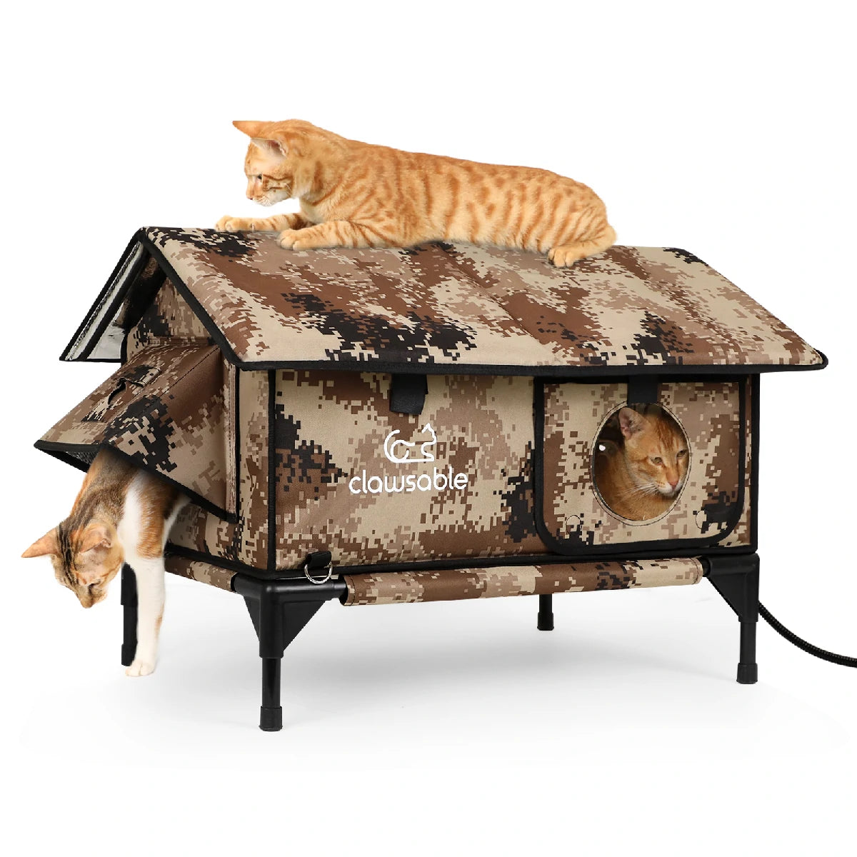 Three cats playing on and inside a desert camouflage heated outdoor cat house, waterproof insulated design keeps pets warm and cozy during winter