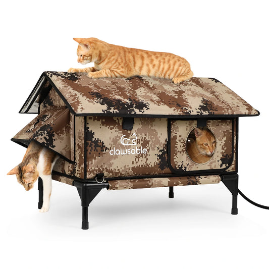 Three cats playing on and inside a desert camouflage heated outdoor cat house, waterproof insulated design keeps pets warm and cozy during winter