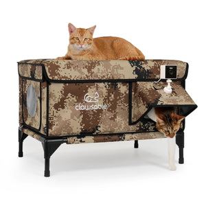 Two cats using a desert camouflage heated outdoor cat house with a camera, waterproof and insulated design provides warmth and safety for pets in winter